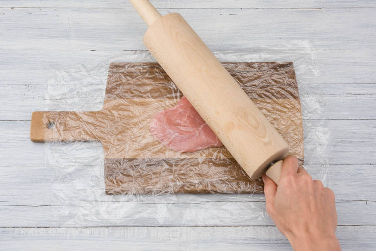 Bash Pork with a rolling pin
