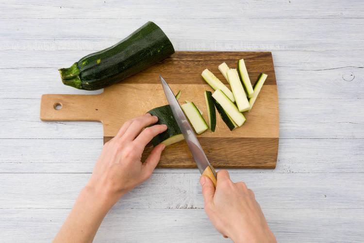 Chop courgettes