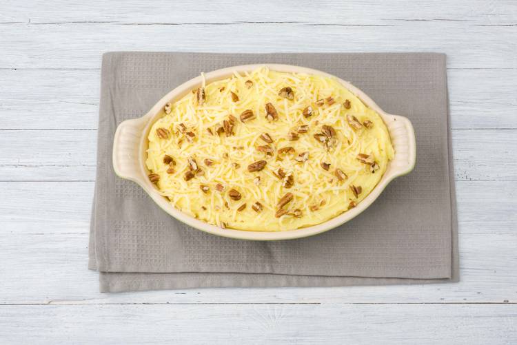 Zet de ovenschaal in de oven.