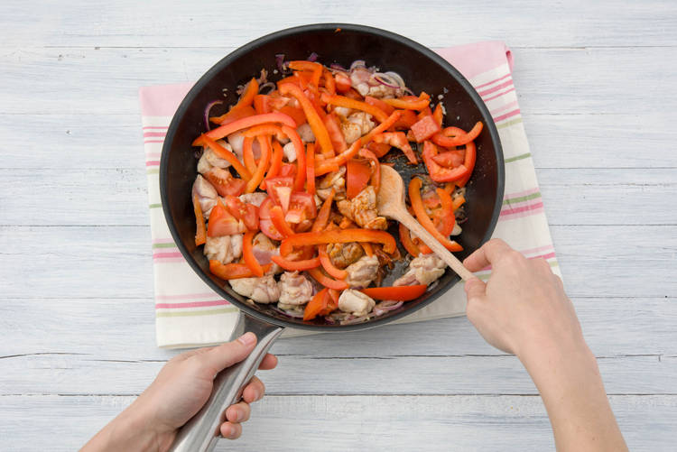 Add the peppers to the pan