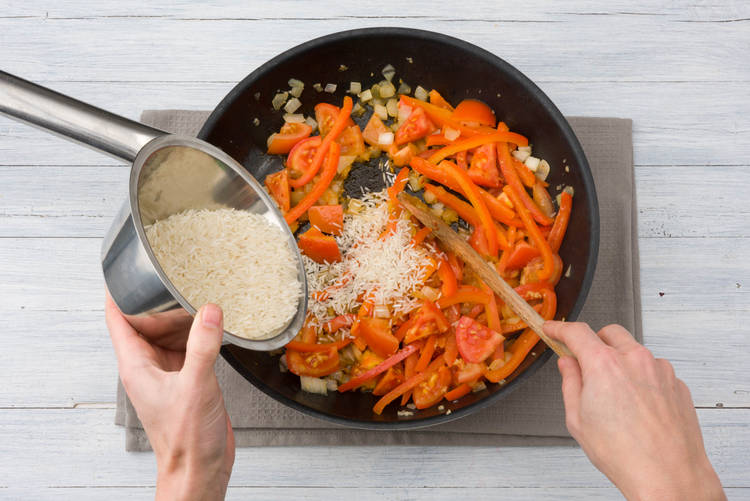 Add rice to the pan