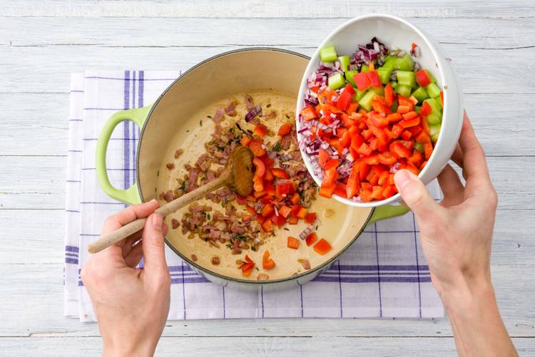 Add veggies to pan