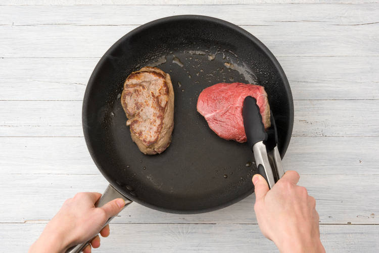 Cook the steaks on each side