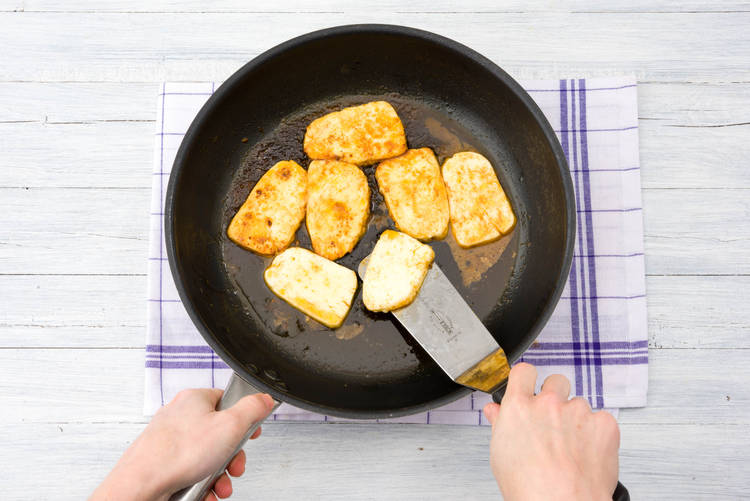 Cook the halloumi until golden