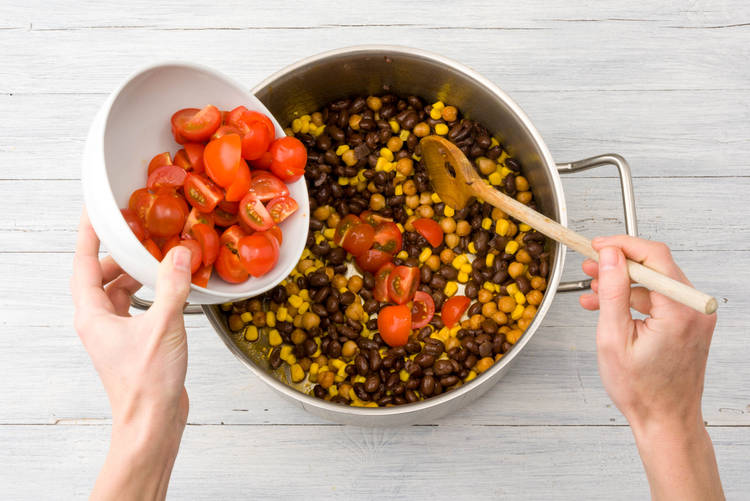 Add the tomatoes to the pan