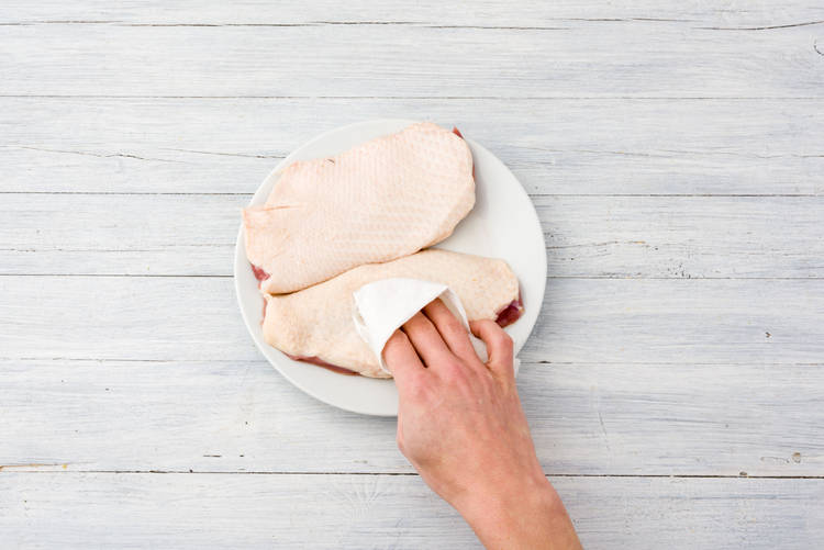 Pat the duck breast dry