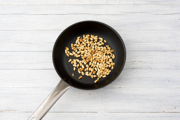 Toast the pine nuts