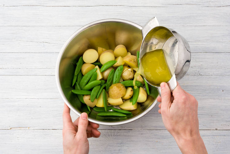 Dress the potatoes & snow peas