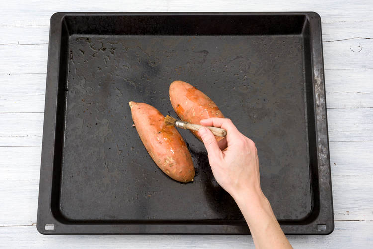 Rub oil into the potatoes