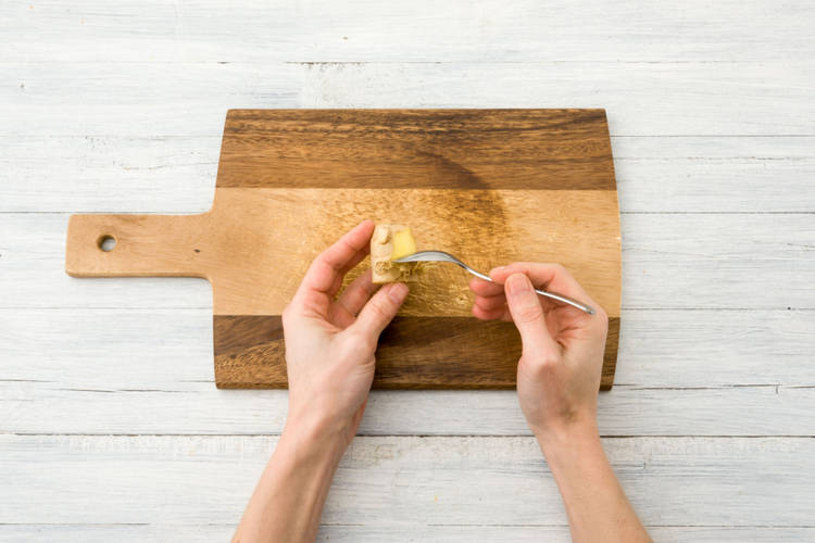 Peel the ginger with a spoon