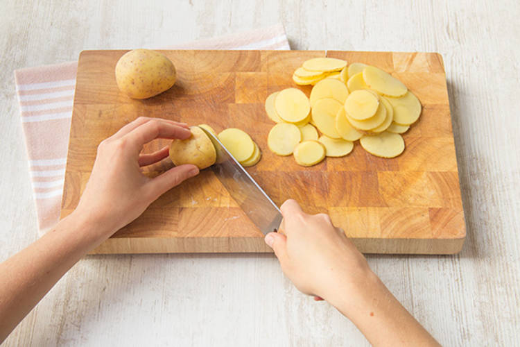 Slice the potatoes