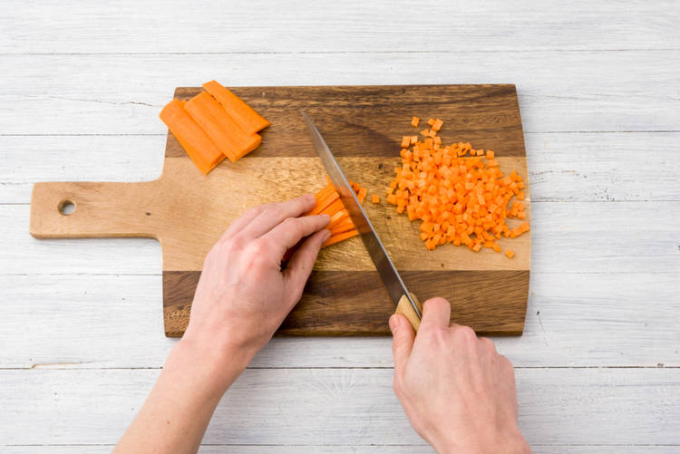 Peel and chop the carrots