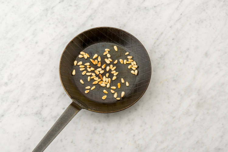 Fry the pine nuts