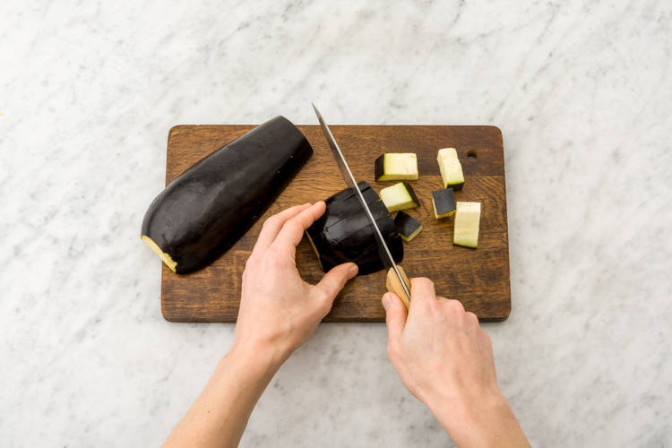 Chop the aubergine into 2cm cubes
