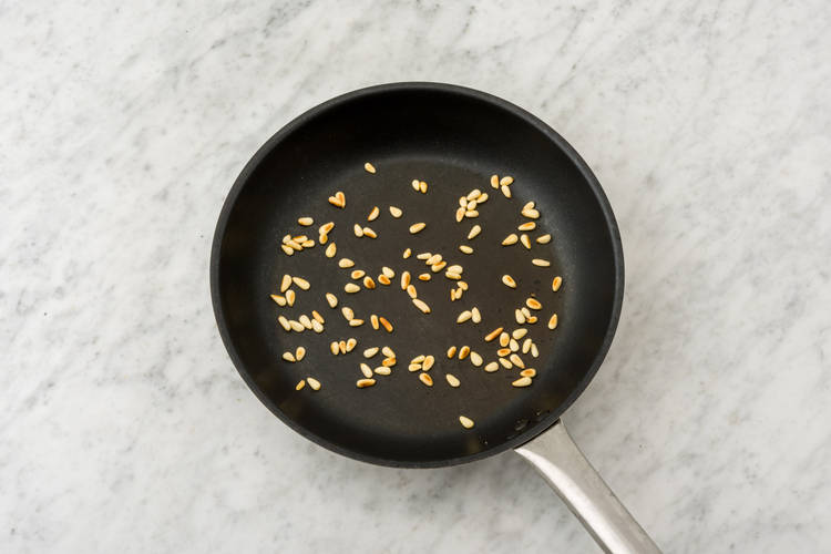 Toast the pine nuts
