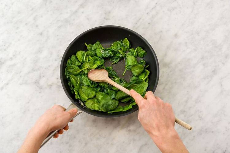 Sauté the spinach