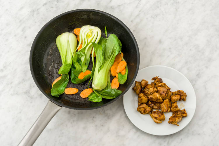 Stir fry vegetables and then return chicken to the pan