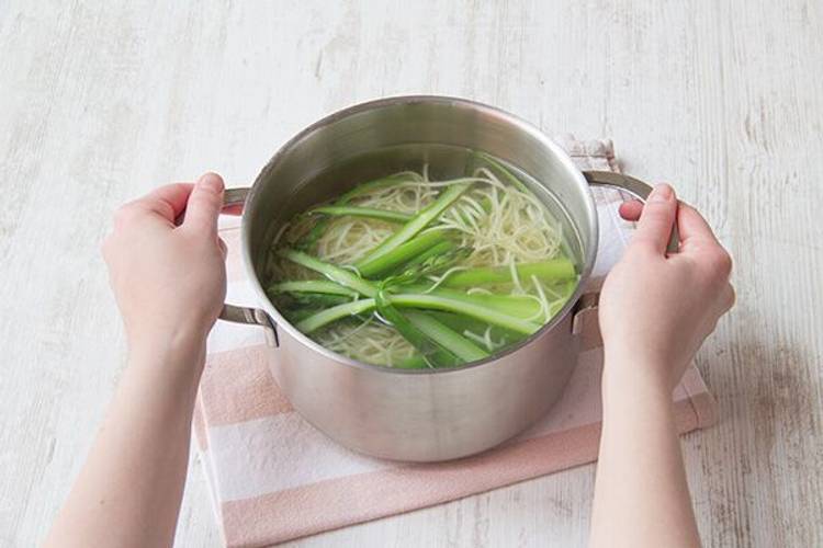 Cook the asparagus and egg noodles