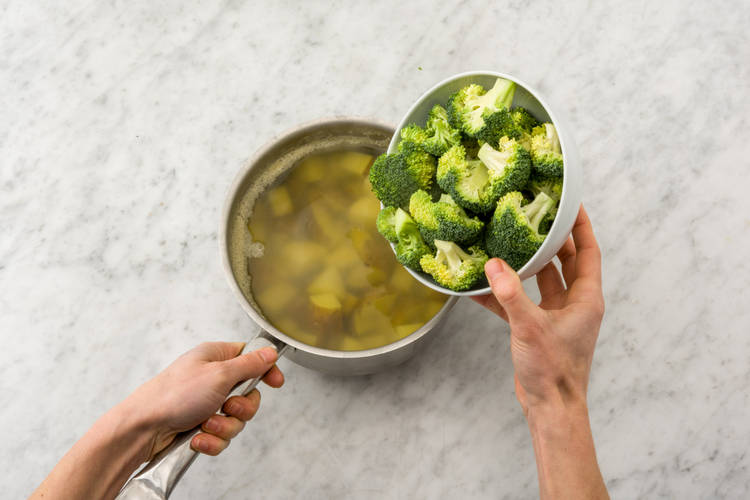 Boil potatoes and broccoli