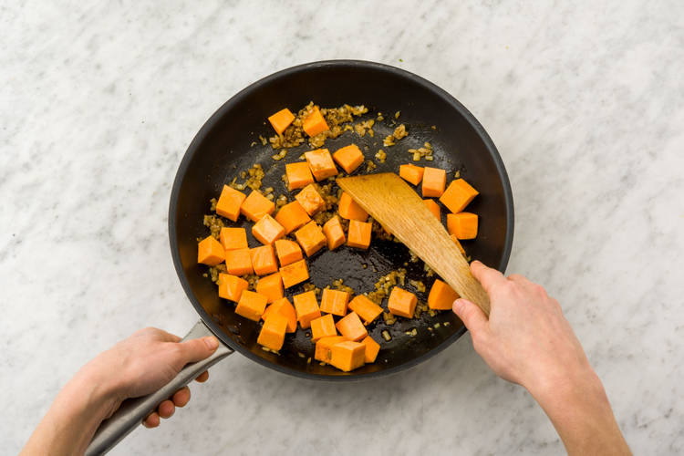 Coat sweet potato in spices