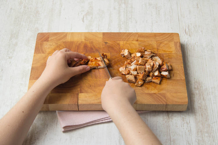 Chop the cooked chicken
