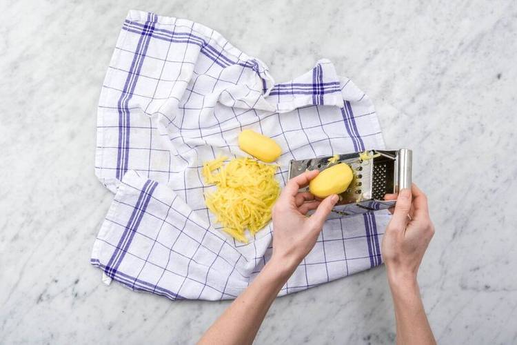 Grate the potatoes