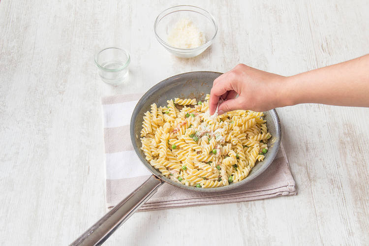 Grate in half the parmesan