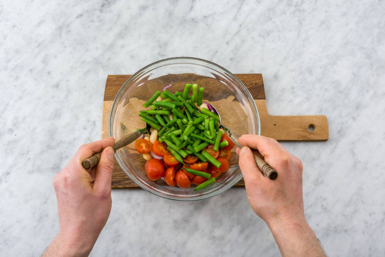 Combine vegetables in a bowl