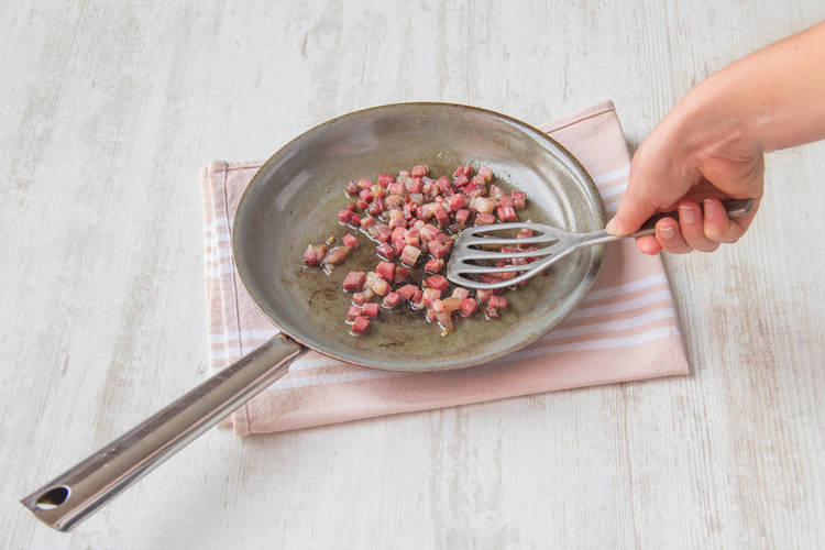Fry the pancetta until crispy