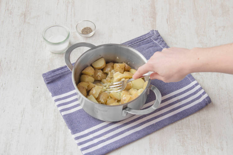 Crush the potatoes with a fork