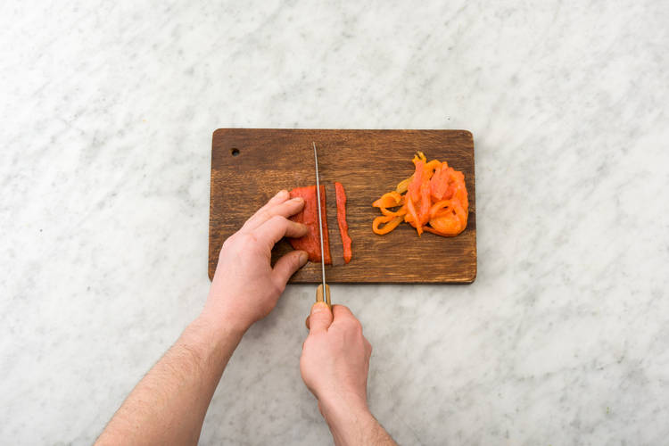 Slice the red capsicum