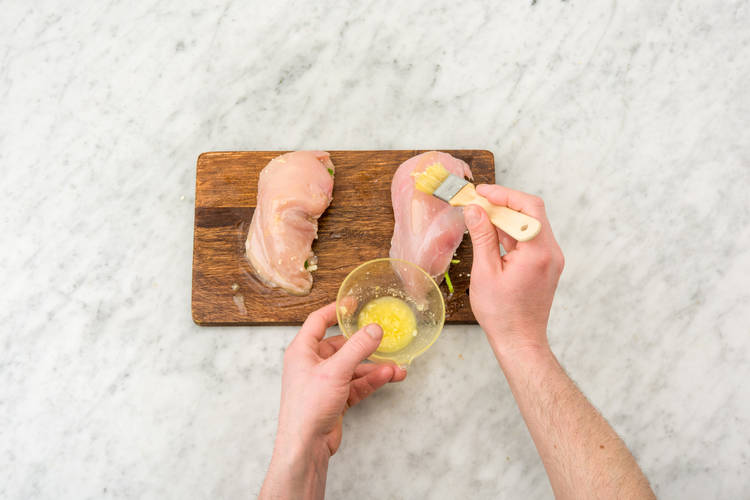 Coat chicken in olive oil and garlic