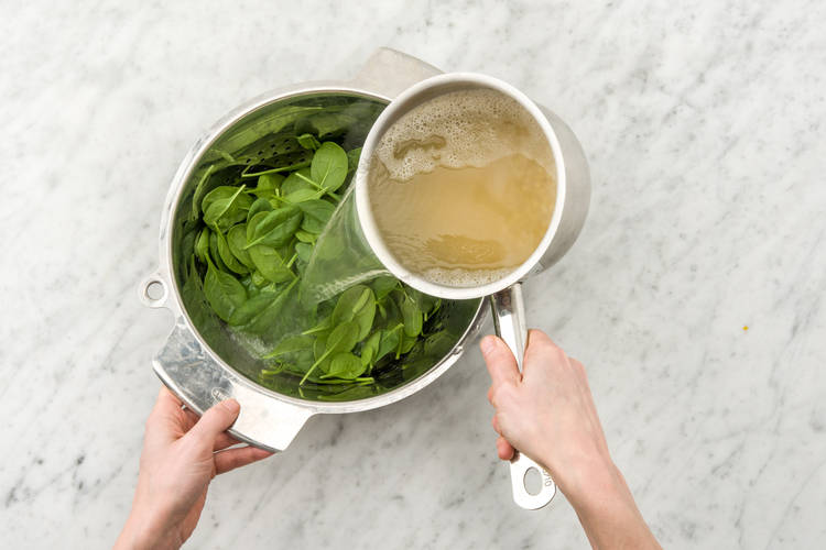 Blanch the baby spinach
