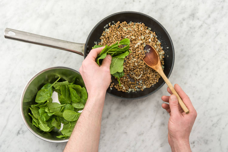 Cook the baby spinach and lentils