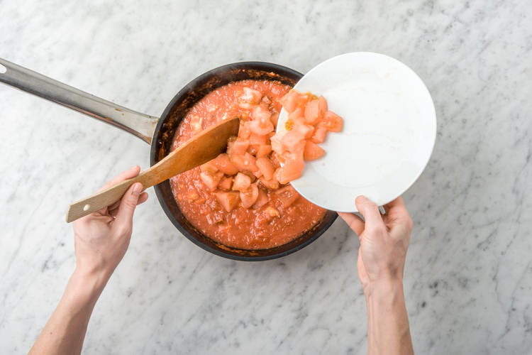 Add the tomatoes