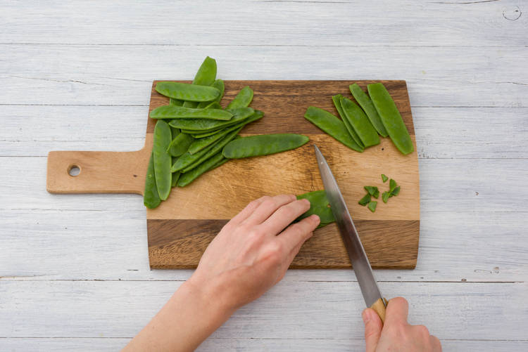 Top and tail the mangetout