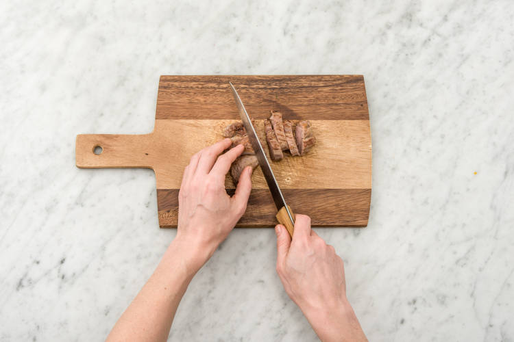 Slice the lamb leg steaks