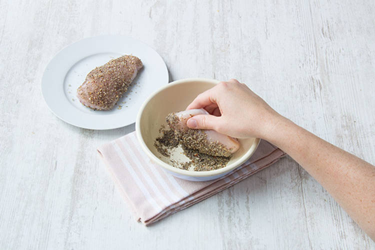 Toss chicken in dukkah