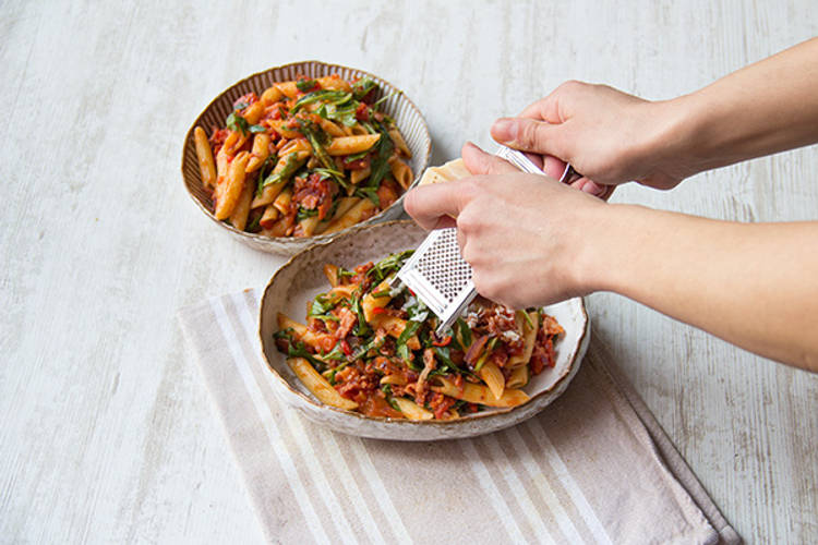 Serve and top with parmesan cheese