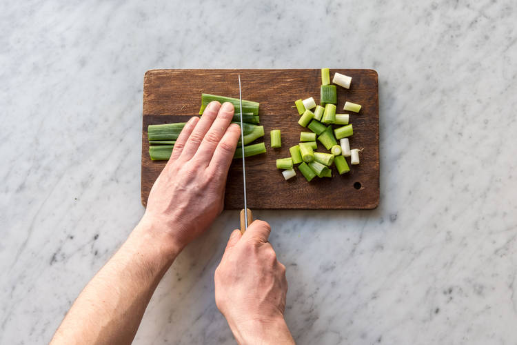 Cut the spring onions into 2 cm lengths