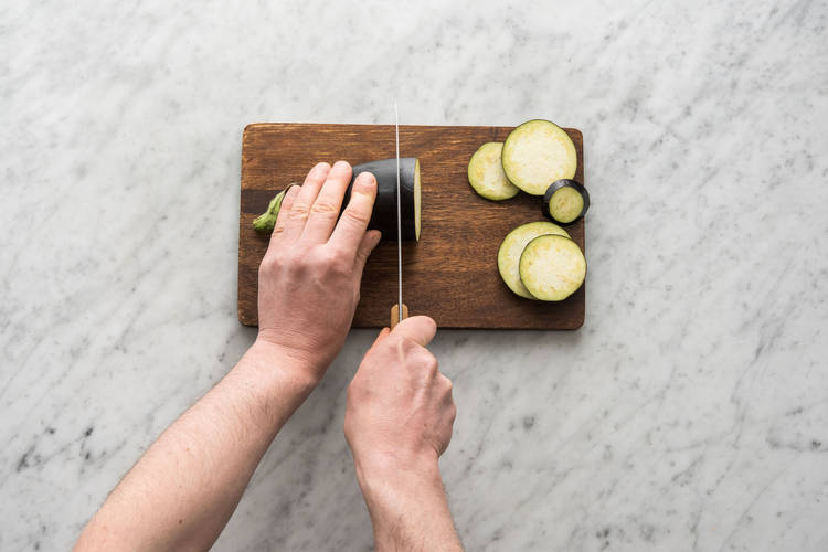 Cut the eggplant into 1 cm thick rounds
