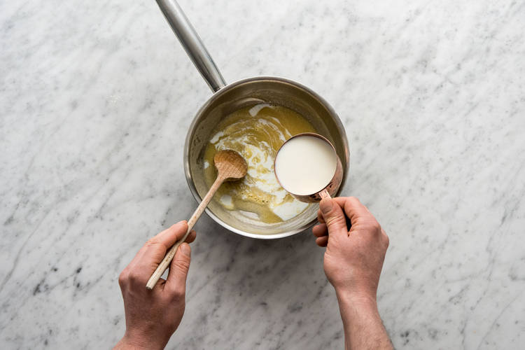 Slowly add the milk