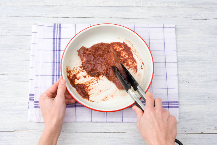 Coat the beef rump steaks