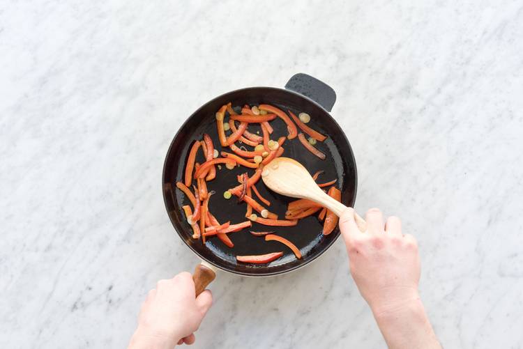 Cook the peppers and scallions
