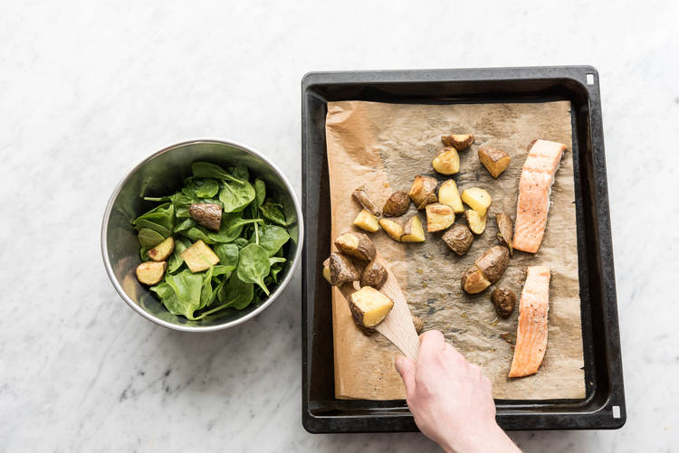 Transfer the hot potatoes to a bowl