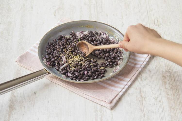 Cook the onions and beans