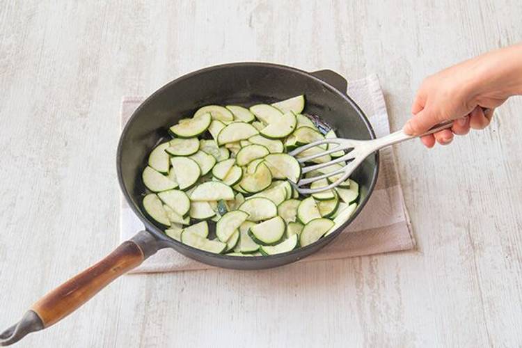 Cook the onion and zucchini