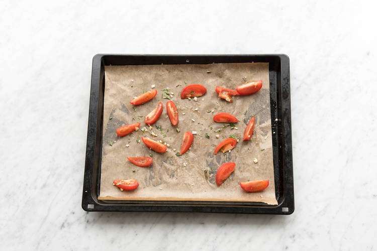 Put the tomatoes on a baking tray