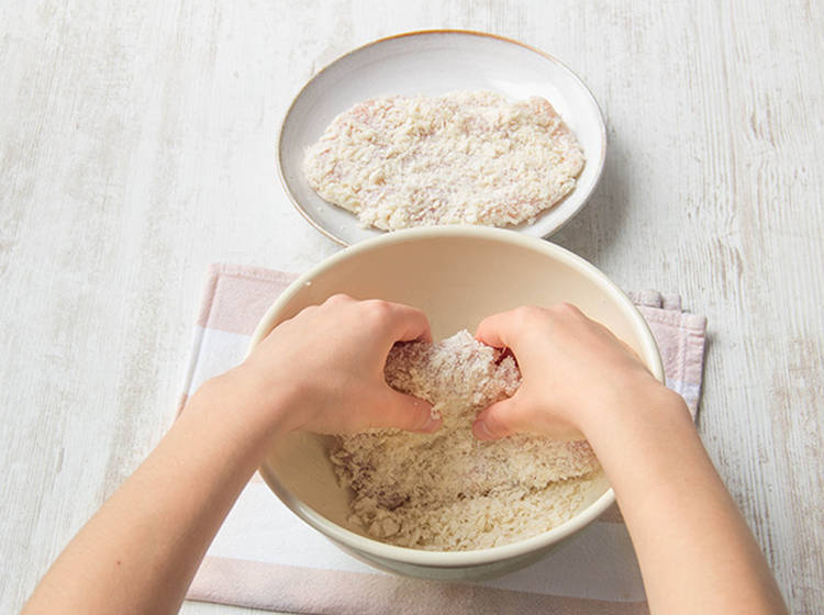 Coat the chicken in breadcrumbs