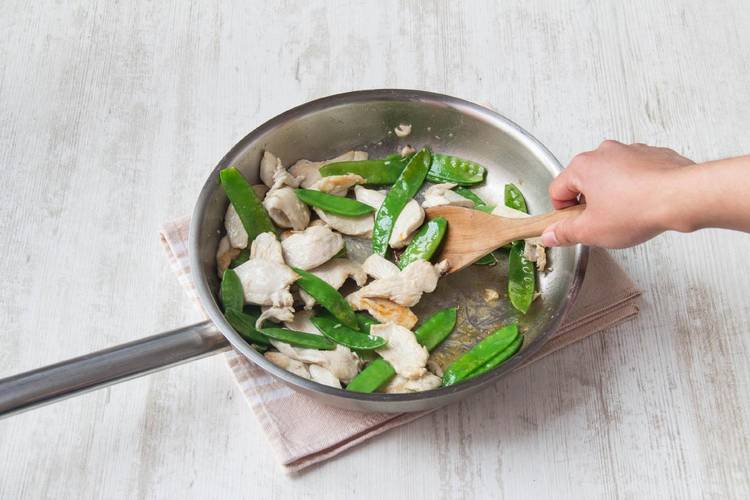 Sauté the chicken and snow peas
